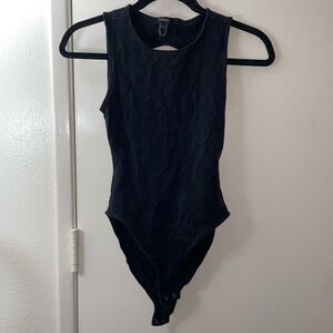 Black backless bodysuit.